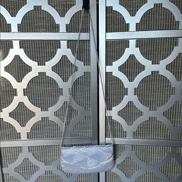 Chic White Wristlet Clutch with Intricate Design - Picture 2 of 10